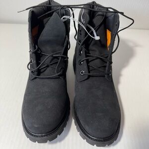 Timberland black leather boots sizes 7 med and 9.5 med.